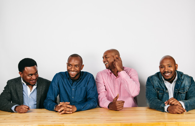  The co-founders of the nonprofit HERE Seattle, from left to right: Andre Bearfield, Todd Bennings, Eric Osborne and Seth Stell. Photo: HERE Seattle. 
