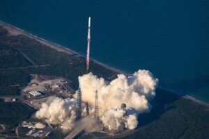 Blue Origin New Glenn rocket rises from pad, as seen from above