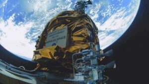 Mira spacecraft in orbit with Earth's disk in the background