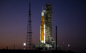 SLS rocket illuminated by lights on Florida launch pad