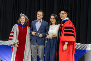 David Dawson and Nodira Khoussainova being presented their awards by Dan Grossman and Magdalena Balazinska (UW Photo / Matt Hagen)