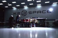 Engineers working on K2 Space's Gravitas satellite on shop floor
