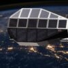 Illustration: Diamondback module in orbit with Earth's night lights sparkling below