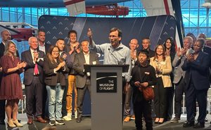 Gov. Bob Ferguson surrounded by Washington Space Council members at Museum of Flight