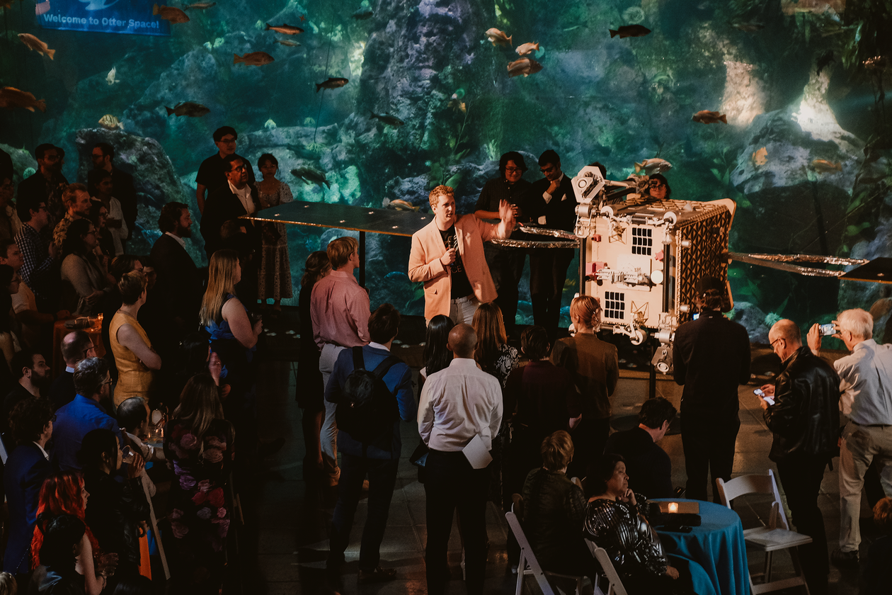 Wider shot of Austin Link and Otter at Seattle Aquarium
