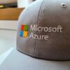 A gray baseball cap embroidered with the Microsoft logo and the words Microsoft Azure.